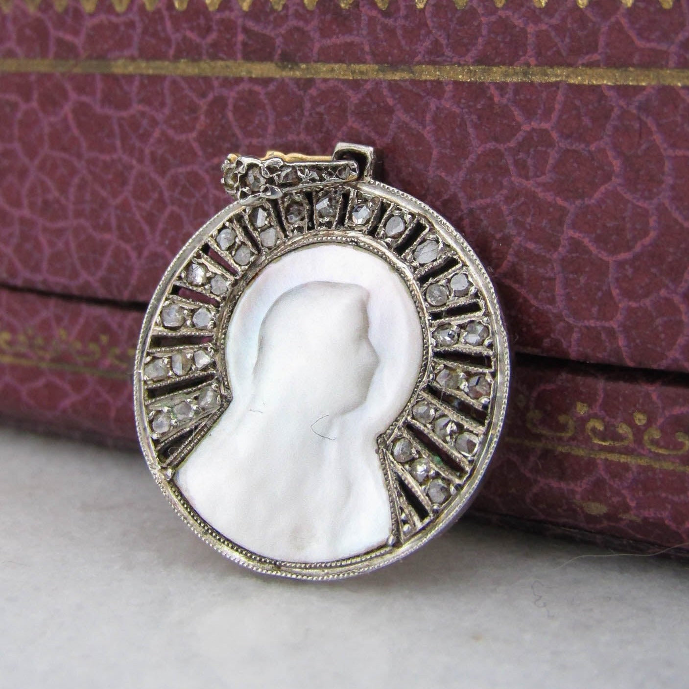 Antique Platinum and 18K Yellow Gold Virgin Mary Pendant with Rose Cut Diamond Halo c. 19000