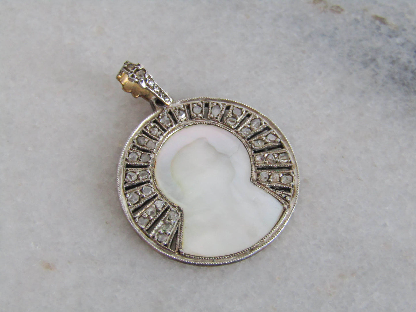 Antique Platinum and 18K Yellow Gold Virgin Mary Pendant with Rose Cut Diamond Halo c. 19000