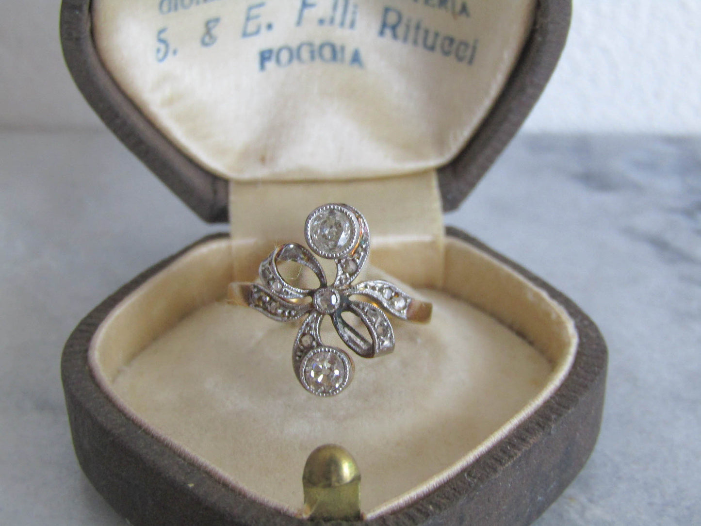 Antique Belle Epoque Old European Cut Diamond Toi et Moi Diamond Bow Ring with Platinum and 18K Gold c. 1900