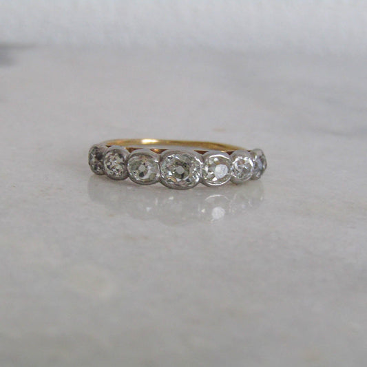 Antique 1.25 Carat Old Mine Cut Seven Stone Diamond 18K Gold and Platinum Ring