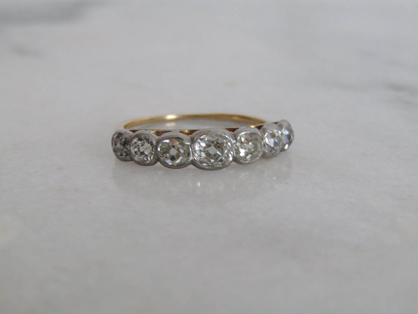 Antique 1.25 Carat Old Mine Cut Seven Stone Diamond 18K Gold and Platinum Ring