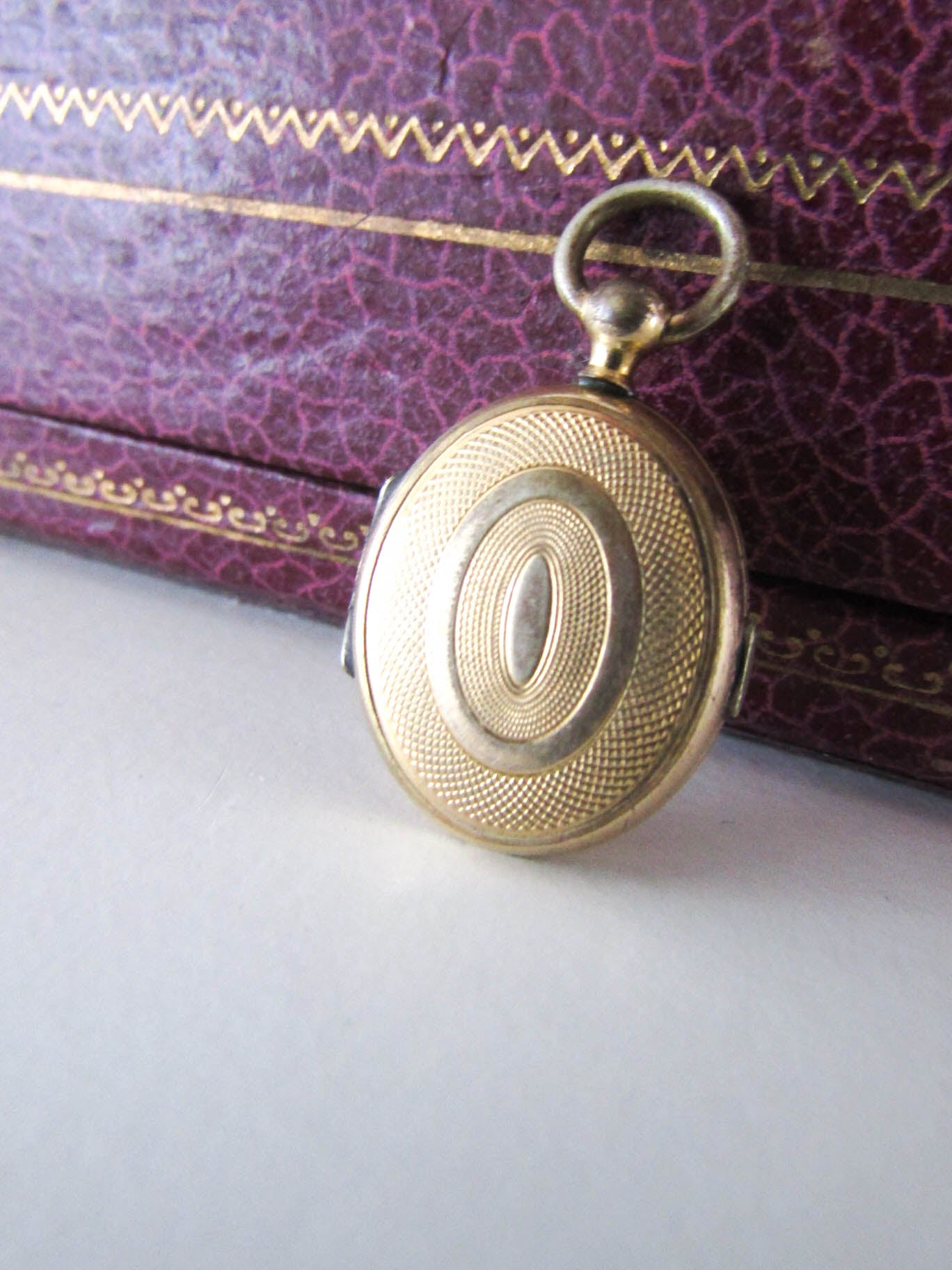 Antique Guilloche Gold Gilt Locket with interior glass frames, Small French Photo Locket