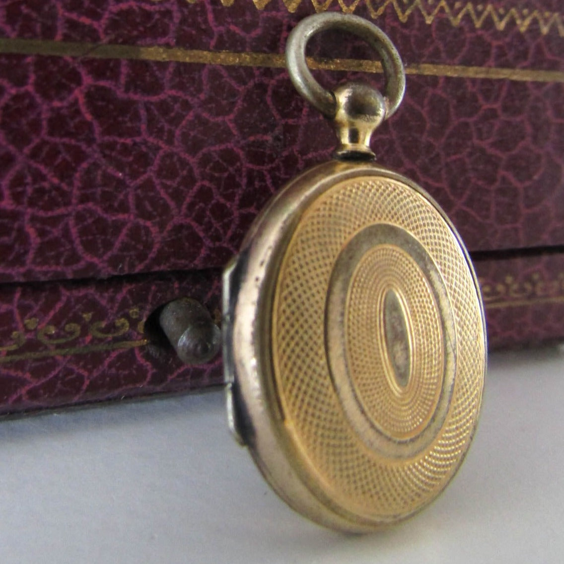 Antique Guilloche Gold Gilt Locket with interior glass frames, Small French Photo Locket