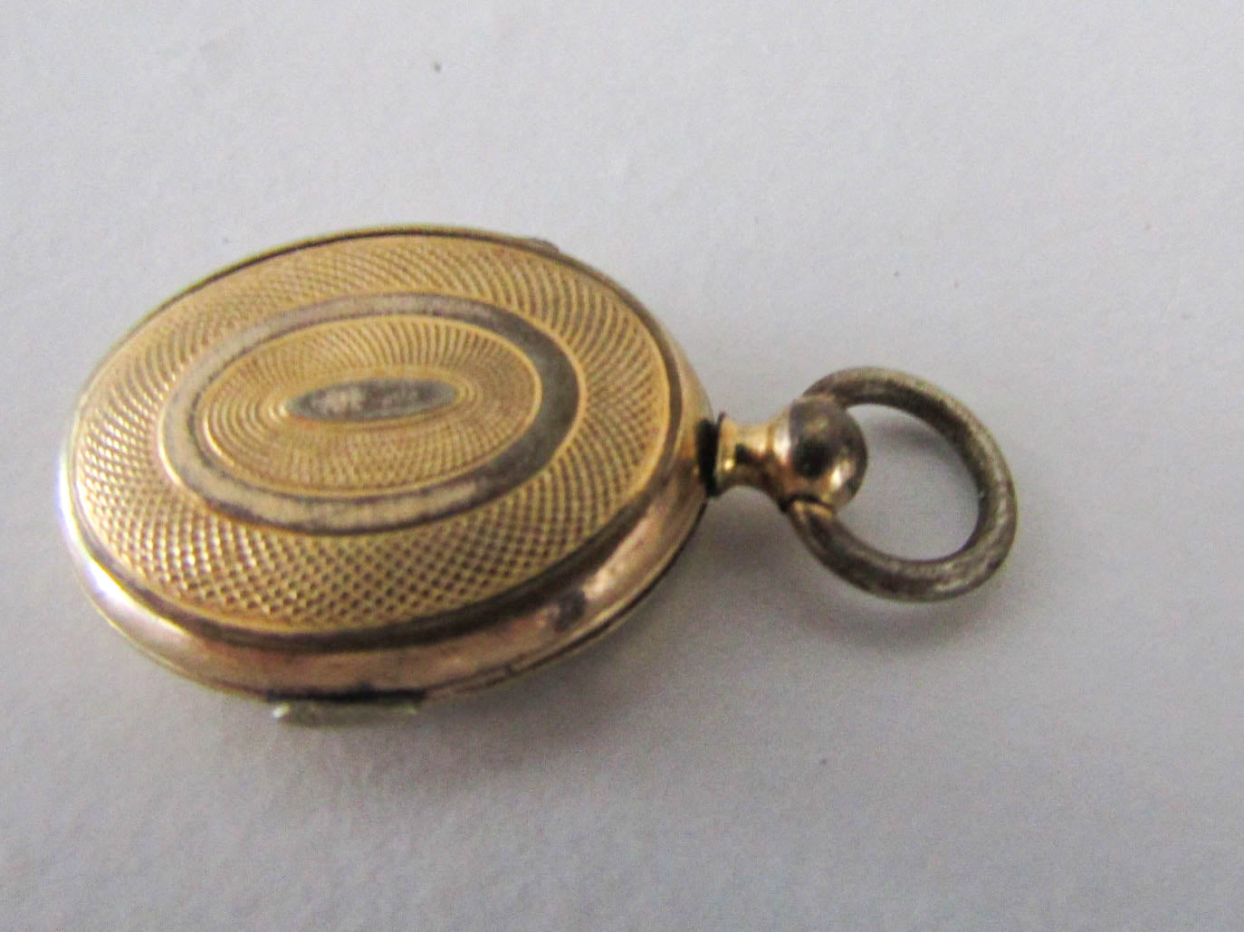 Antique Guilloche Gold Gilt Locket with interior glass frames, Small French Photo Locket