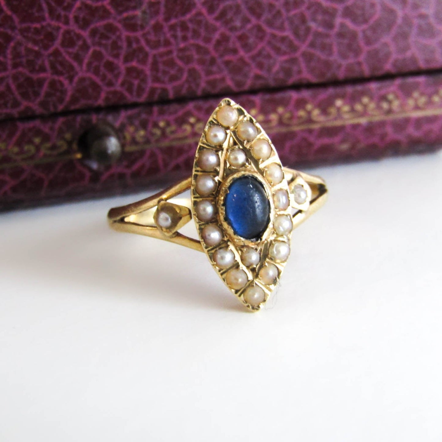 18K Edwardian Navette Cluster Ring with Seed Pearls, Pierced Gallery, and Sapphire Paste