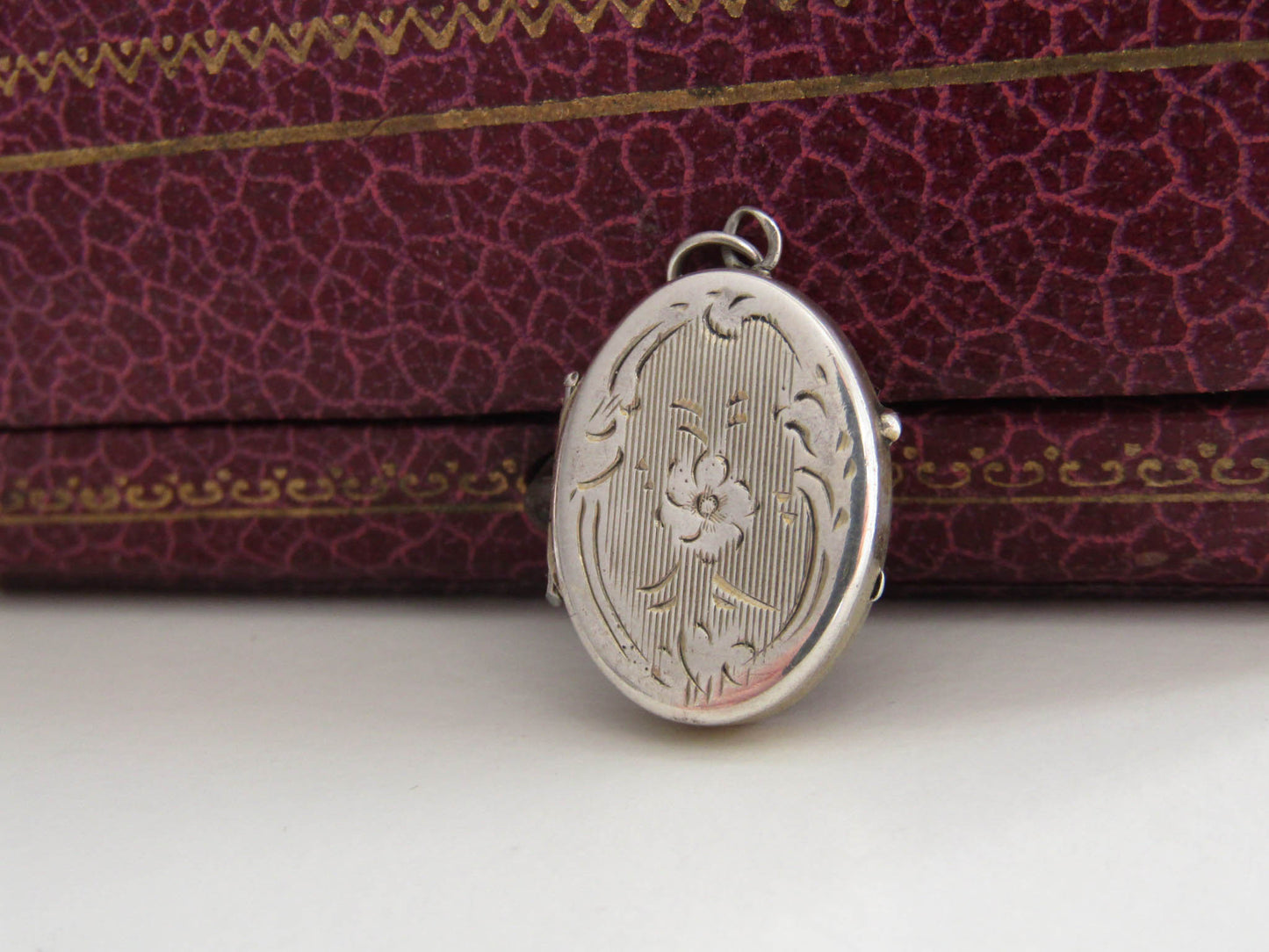 Small Silver Art Nouveau Guilloche Locket w gold interior