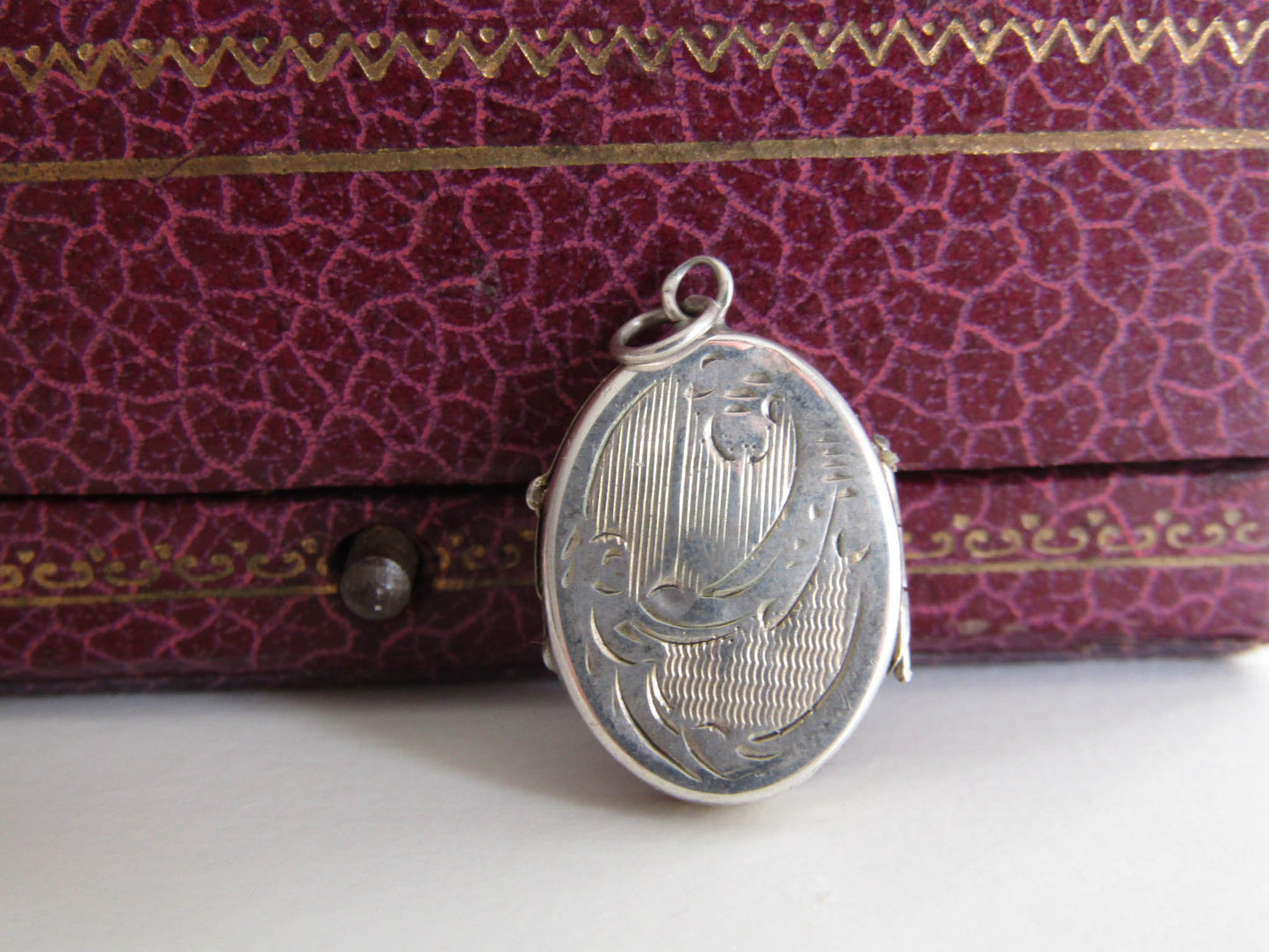 Small Silver Art Nouveau Guilloche Locket w gold interior